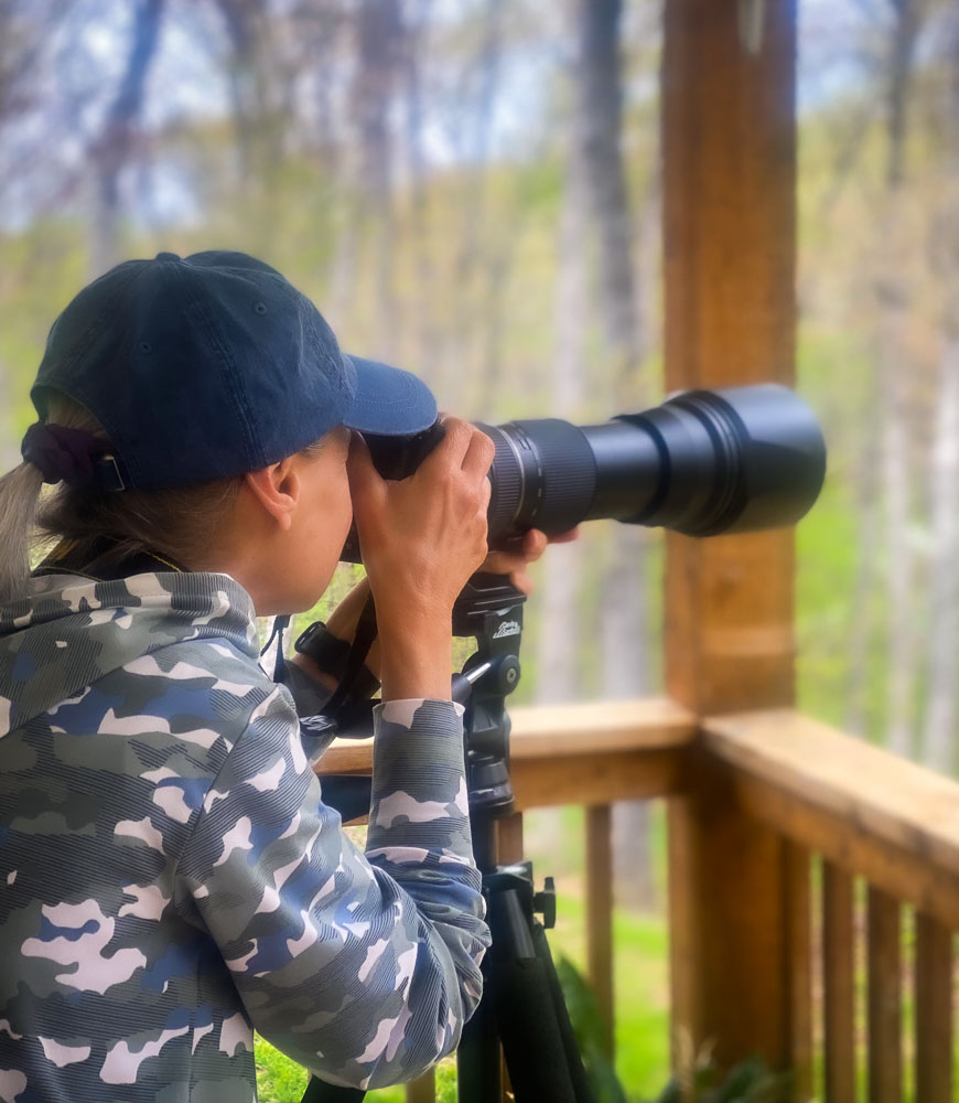 A photo of Anita using camera.